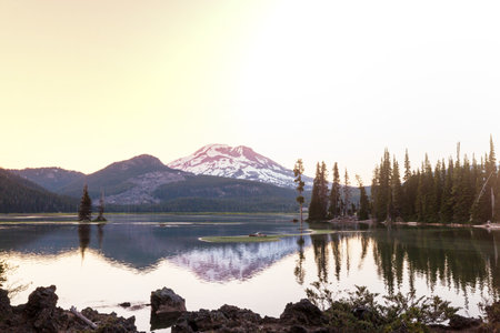 Serene beautiful lake in morning mountains, Oregon, USA.