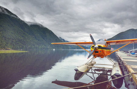 Float Plane in the mountains lake, Canadaの写真素材