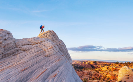 Hike in the Utah mountains. Hiking in unusual natural landscapes. Fantastic forms sandstone formations.の写真素材