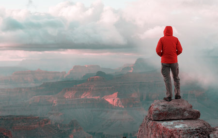 Traveler on cliff mountains over Grand Canyon National Park, Arizona, USA.Inspiring emotion. Travel Lifestyle journey success motivation concept adventure  vacations outdoor concept.の写真素材