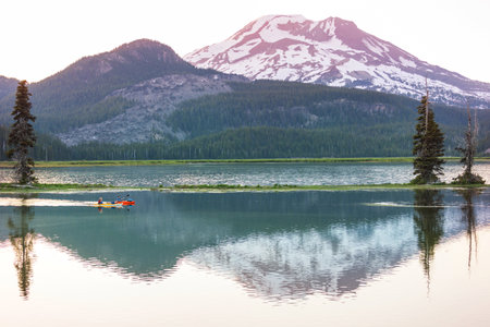 Serene beautiful lake in morning mountains, Oregon, USA.の写真素材