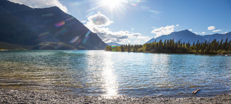 Serene scene by the mountain lake in Canadaの写真素材