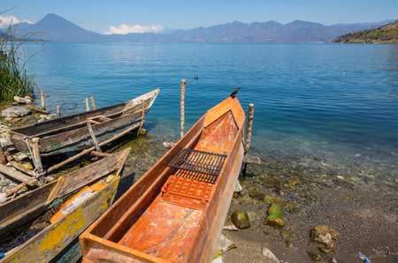 Beautiful lake Atitlan and volcanos in the highlands of Guatemala, Central Americaの写真素材