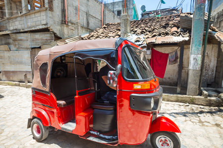 Tuktuk taxi near tea plantation on Sri Lankaの写真素材