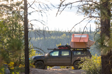 Camping car in recreation site at sunriseの写真素材