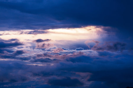 Unusual storm clouds at sunset.  Suitable for background.