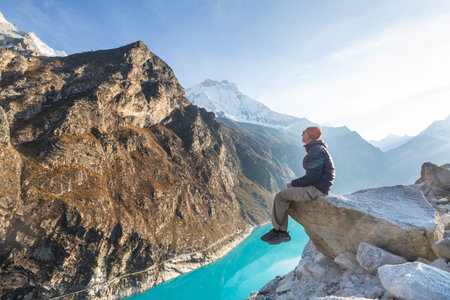 Hiker admires the lake  Paron in Cordillera Blanca,  Peru, South Americaの写真素材