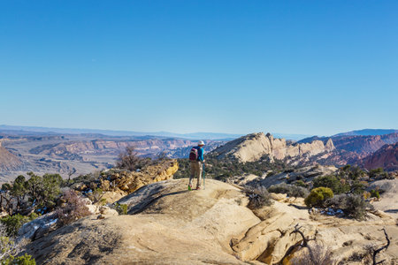 Hike in the Utah mountains. Hiking in unusual natural landscapes. Fantastic forms sandstone formations.の写真素材