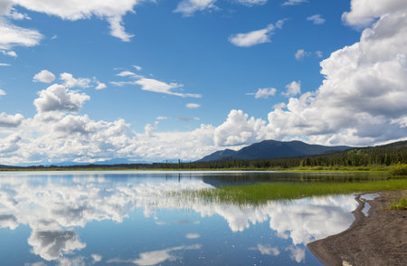 Serene scene by the mountain lake in Canada