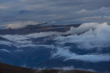 Beautiful morning scene in the mountains. Fog at sunrise.の写真素材