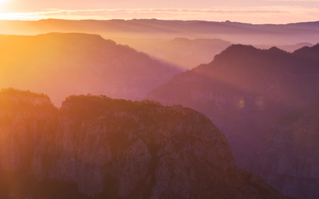 Scenic Sunset in the mountains. Beautiful natural background.の写真素材