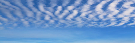 Sunny background, blue sky with white clouds, natural background.