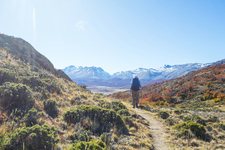 Hike in the autumn mountains. Fall season theme.の写真素材