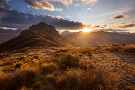 Scenic Sunset in the mountains. Beautiful natural background. Cordillera mountains in Peru.の写真素材