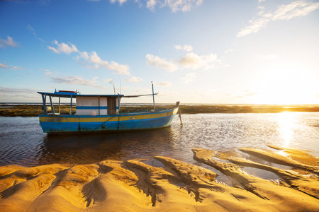 The fishing boats on ocean beach in Brazil, South Americaの写真素材