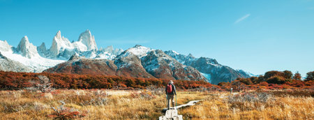 Hike in the autumn mountains. Fall season theme.の写真素材