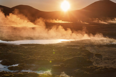 Geothermal field in Altiplano at sunrise, Chile, South Americaの写真素材