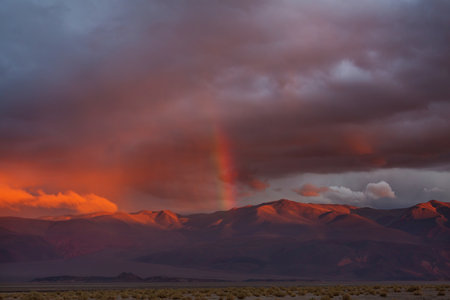 Rainbow above mountains. Beautiful natural landscapes. Picturesque nature.の写真素材