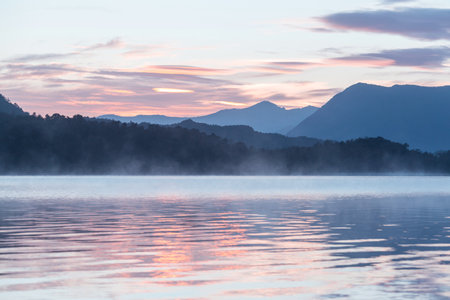 Sunrise scene on beautiful serene lake. Beautiful natural background. Patagonia, Argentina, South America.の写真素材