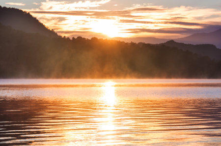 Sunrise scene on beautiful serene lake. Beautiful natural background. Patagonia, Argentina, South America.の写真素材