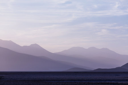 mountain silhouette at sunrise in Peru, South Americaの写真素材