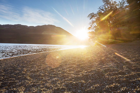 Sunrise scene on beautiful serene lake. Beautiful natural background. Patagonia, Argentina, South America.の写真素材