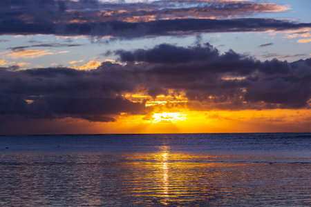 Ocean beach at sunset for natural backgroundの写真素材