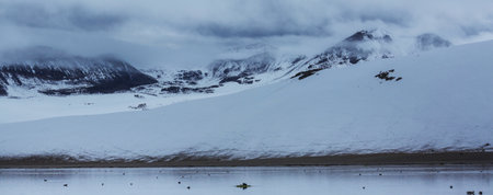 Serenity lake in winter season. Cordillera mountains, Peru, South Americaの写真素材