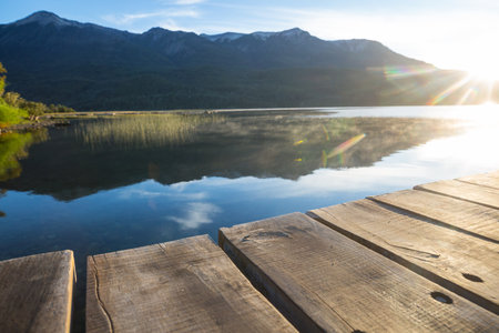 Wooden pier in serenity lake in Patagonia, Argentinaの写真素材