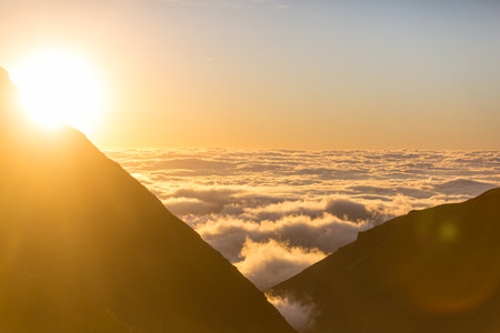 Beautiful view above clouds in mountainsの写真素材