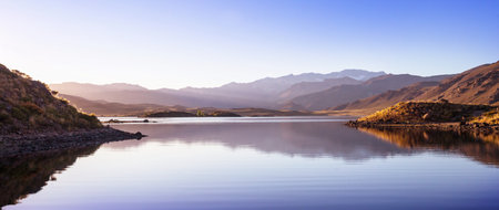 Sunrise scene on beautiful serene lake. Beautiful natural background. Patagonia, Argentina, South America.の写真素材