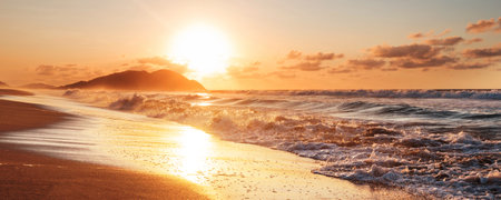 Ocean beach at sunset for natural backgroundの写真素材