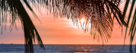 Ocean beach at sunset for natural backgroundの写真素材