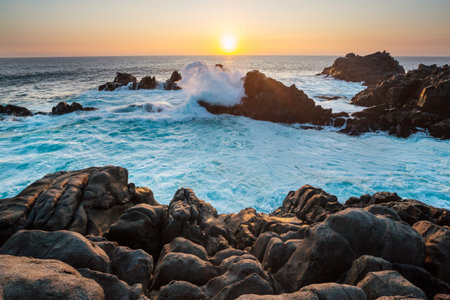 Beautiful rocky beach on the Pacific Ocean in Chile, South Americaの写真素材