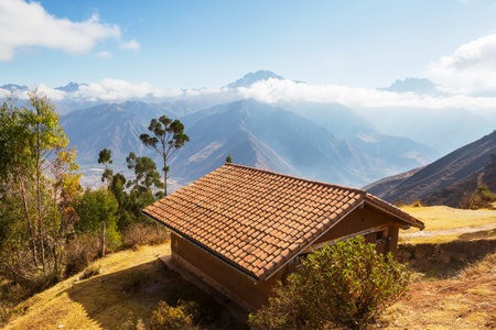 Traditional adobe house in small mountains village, Peruの写真素材