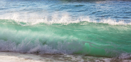 Blue wave on stormy clouds background.. Dramatic natural background.