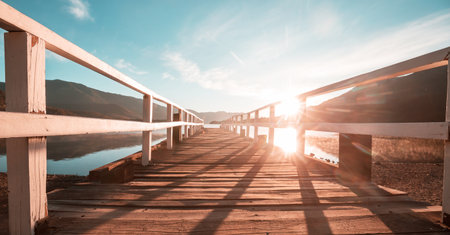 Wooden pier in serenity lake in Cordillera mountains, Peruの写真素材