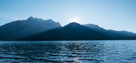 Serene scene by the mountain lake in Canadaの写真素材