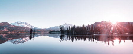 Serene beautiful lake in morning mountains, Oregon, USA.
