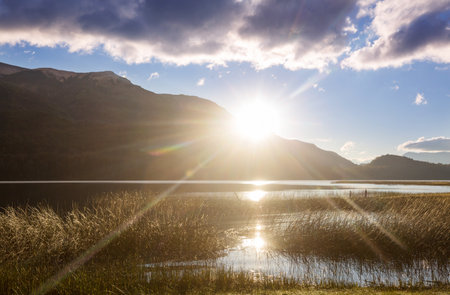 Sunset scene on the lake at sunset . Beautiful nature landscapesの写真素材