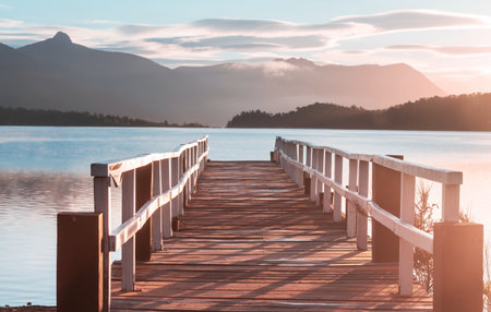 Wooden pier in serenity lake in Cordillera mountains, Peruの写真素材