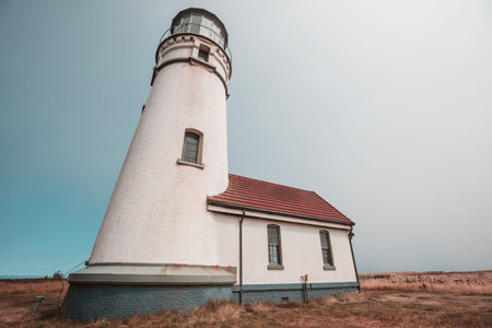 a lighthouse on a picturesque seashoreの写真素材