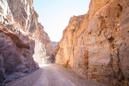 Road in narrow Titus canyon in Death Valley National Park, USA, California
