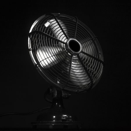 ventilator or fan in action (black background)の写真素材