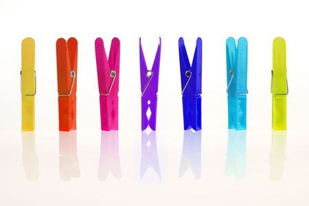 Colorful clothespin in a rowの写真素材