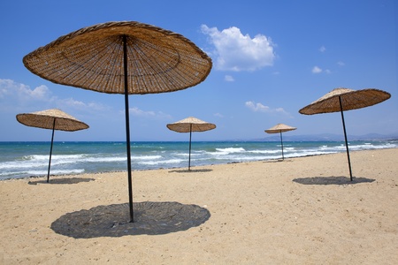 five umbrellas on the beachの写真素材