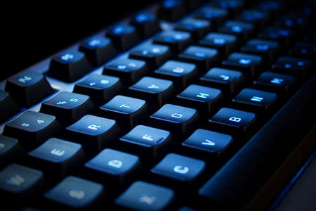 Blue neon Keyboard in a dark areaの写真素材