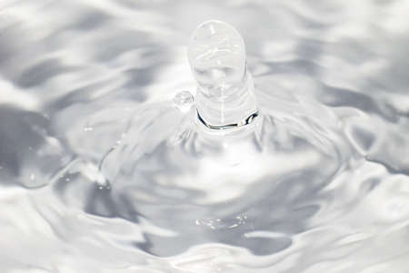 Water drop isolated on whiteの写真素材