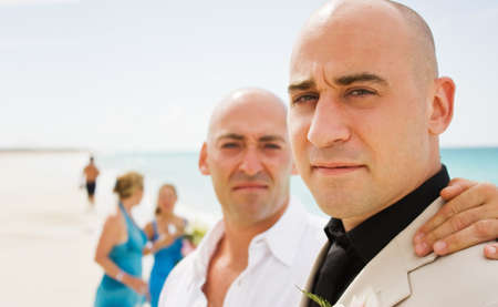 Groom and one of his groomsmen (also his brother)の写真素材