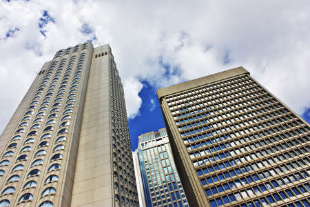 Skyscrapers in downtown montreal on a beautiful cloudy skyの写真素材